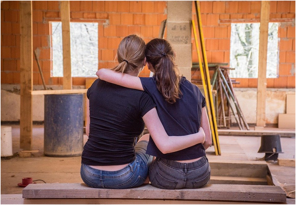 women hugging women inspiring women