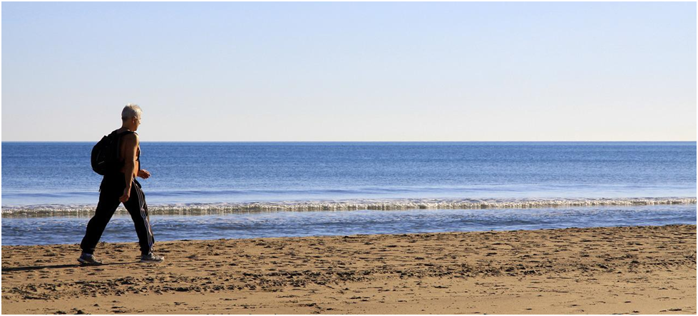 Protecting Mental Health Man Walking On The Beach