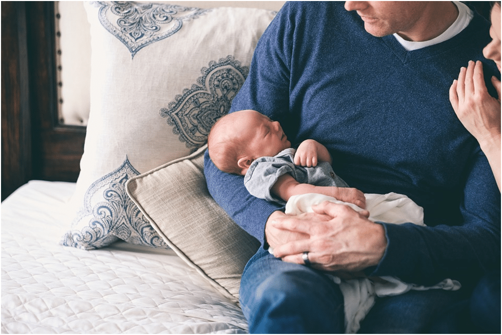 Happy Valentine's Day A father Holding His Newborn Child